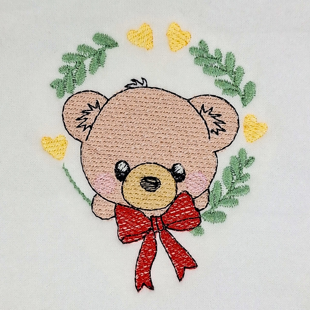 Baby Bear With Red Bow In Wreath Machine Embroidery Design
