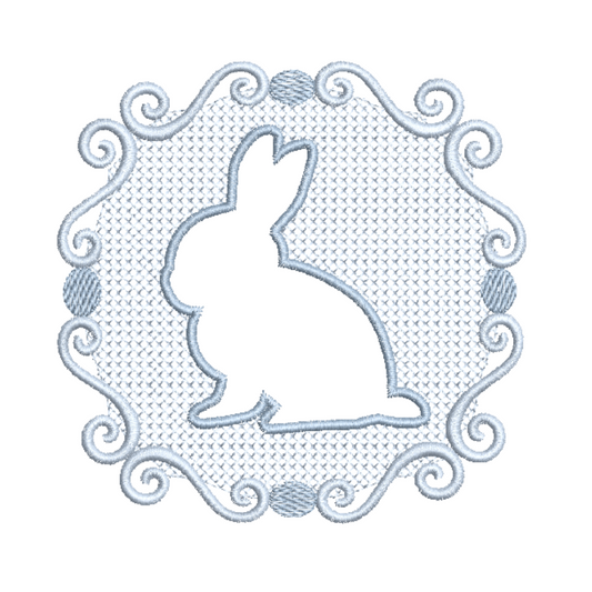 This is an image of a machine embroidery design by Stitches & Strokes, featuring an embossed bunny silhouette with a cross stitch border and filigree detail. This embossed bunny machine embroidery pattern is perfect for embroidery on Easter decor and Baby    Gifts like travel bags, crib bedding, and more.