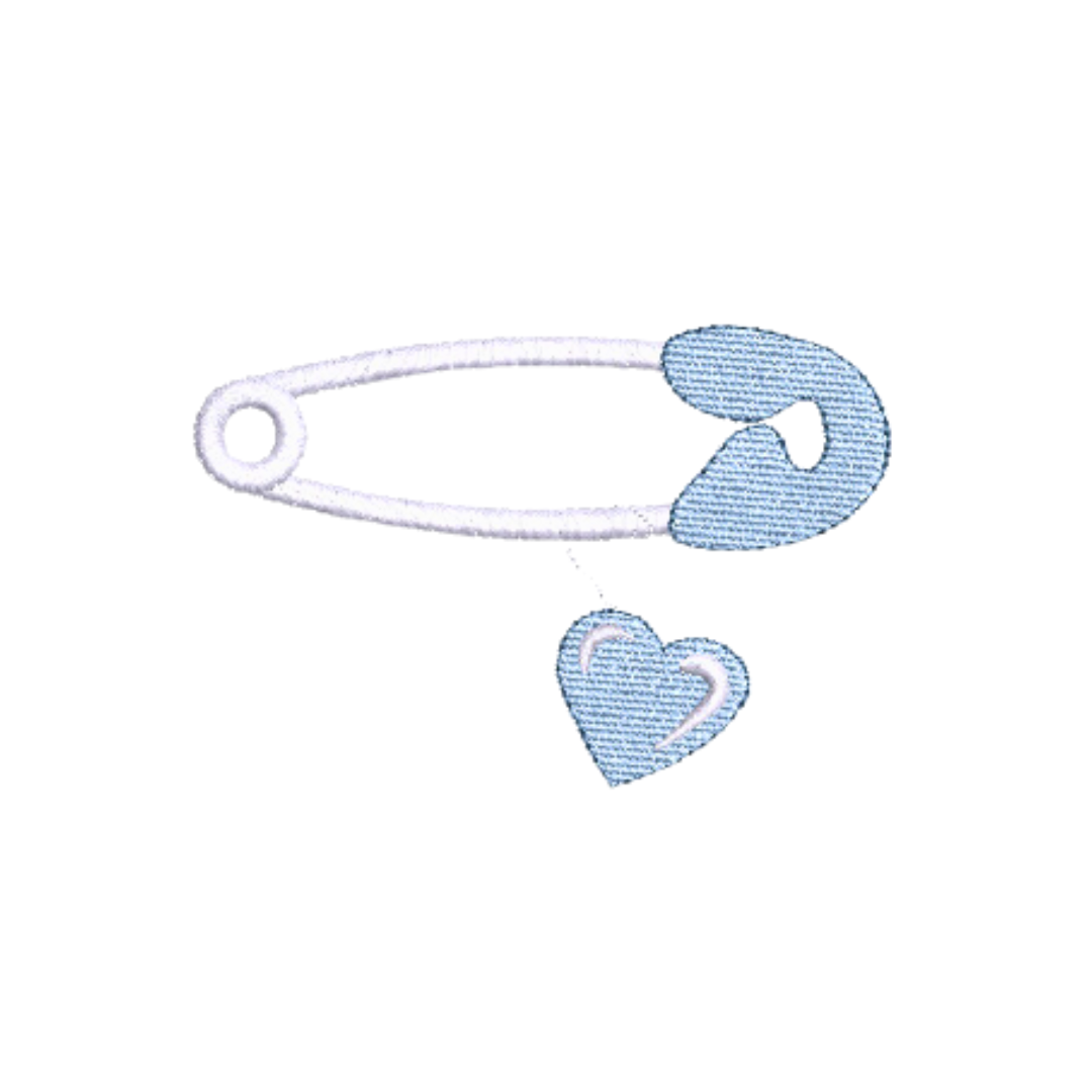 This is an image of an easy machine embroidery design featuring a baby diaper pin with a little blue heart. This diaper pin machine embroidery design is perfect for embroidery on baby onesies, bibs, blankets, and more.