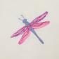 This is an image of a pink and purple dragonfly machine embroidery design. This dragonfly machine embroidery pattern is easy to make and is ideal for any project that needs a little sprucing up. Also add this dragonfly to brand-new creations like tote bags, tablecloths, denim pockets, and more.