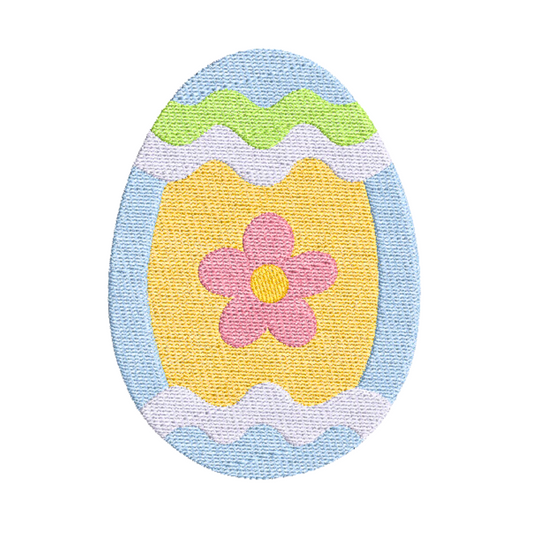 This is an image of an Easter egg in blue and yellow with a pink flower machine embroidery design. 