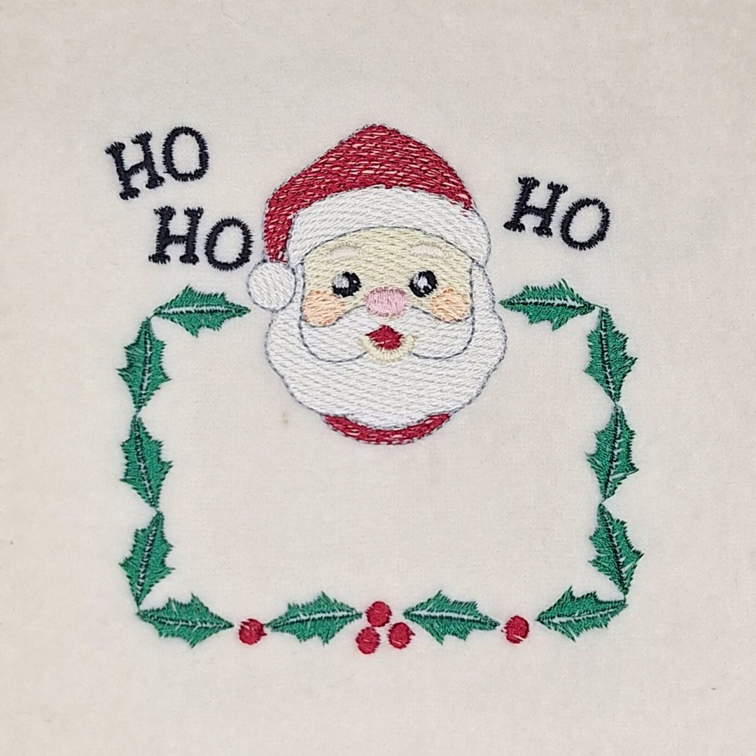 Santa Clause Face In Holly Frame Machine Embroidery Design