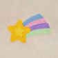 This is an image of a machine embroidery design featuring a bright yellow shooting star with a rainbow colored tail. This star machine embroidery design is a available in 4x4, 5x7, and 6x10 embroidery hoop. Make this machine embroidery design the star of your next baby shower gift project.