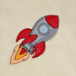 This is an image of a machine embroidery design featuring a red and grey spaceship launching into space.