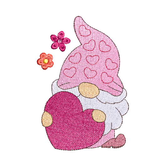 This is an image of a Valentine's Gnome machine embroidery design, featuring a pink hat and holding a bright pink heart. This Gnome machine embroidery design is perfect to show your love on Valentine's Day by embroidering it on gifts like bags, pencil cases, t-shirts, and more.