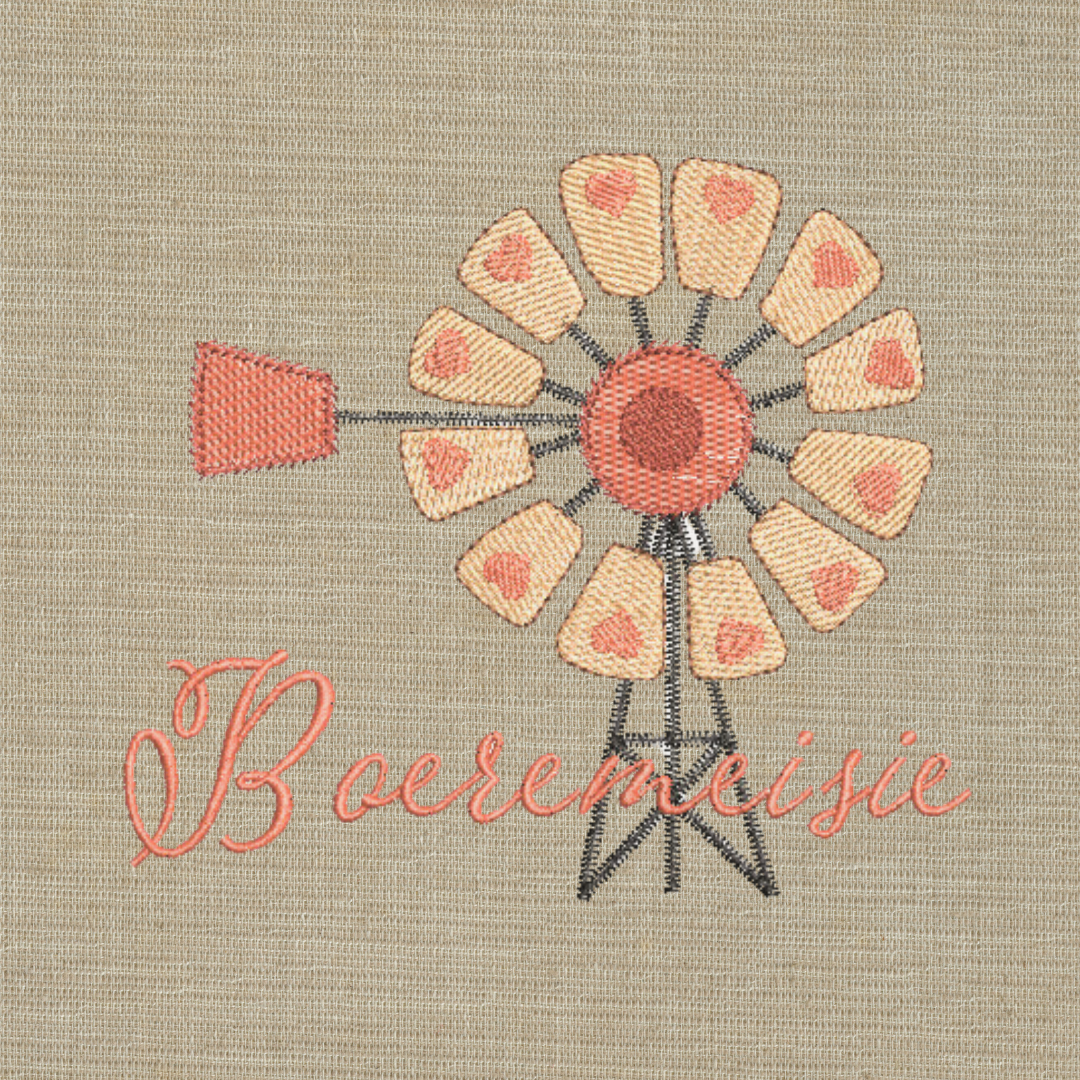 This is an image of a machine embroidery design by Stitches & Strokes, featuring a Windmill with hearts, and an Afrikaans "Boeremeisie" Quote. This Windmill with Boeremeisie Afrikaans Quote Machine Embroidery Design is perfect for embroidery on t-shirts for women's and girl's t-shirts.